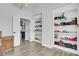 Spacious walk-in closet with custom shelving for shoes and accessories at 2745 Oak Manor Dr, Mount Pleasant, SC 29466