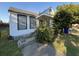 Modest home featuring simple architecture, side yard and traditional window design at 28 Gordon St, Charleston, SC 29403