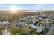 Expansive aerial view of a residential neighborhood nestled among lush greenery near the water at 3019 Viscount St, Charleston, SC 29424