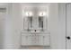 Elegant bathroom featuring a double vanity with stylish mirrors and fixtures at 3019 Viscount St, Charleston, SC 29424
