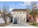 Exterior view of a detached two-car garage with a charming golf cart parked in the driveway at 3019 Viscount St, Charleston, SC 29424