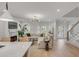 Bright, open-concept living room featuring stylish decor, a fireplace, hardwood floors, and ample natural light at 3019 Viscount St, Charleston, SC 29424