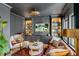 Stylish living room featuring custom bookshelves, muted colors, and sleek furnishings at 3019 Viscount St, Charleston, SC 29424