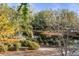 Scenic view of a tranquil pond surrounded by lush trees and landscaping, creating a peaceful retreat at 3019 Viscount St, Charleston, SC 29424