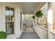 Inviting porch with rocking chairs, fern hangings, and a view of the neighborhood at 3019 Viscount St, Charleston, SC 29424