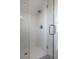 Elegant shower with glass door, white tile, and modern fixtures, showcasing a clean and stylish design at 3019 Viscount St, Charleston, SC 29424