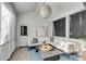 Inviting sunroom with comfortable seating, decorative lighting, and serene ambiance at 3019 Viscount St, Charleston, SC 29424