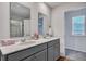 Modern bathroom with a dual vanity, framed mirrors, and a bright, airy feel at 302 Willow Pointe Cir, Summerville, SC 29486