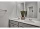 Bright bathroom features a double vanity with white countertops and modern fixtures at 302 Willow Pointe Cir, Summerville, SC 29486