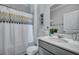 Bathroom featuring modern vanity, neutral finishes, and shower with decorative curtain at 302 Willow Pointe Cir, Summerville, SC 29486