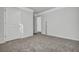 Neutral bedroom featuring gray carpet, crown molding, and standard doors leading to other rooms at 302 Willow Pointe Cir, Summerville, SC 29486