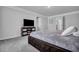 Comfortable bedroom featuring plush carpet and contemporary media center at 302 Willow Pointe Cir, Summerville, SC 29486