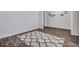 Neutral bedroom showcasing wood floors and a decorative area rug, ready for personalization at 302 Willow Pointe Cir, Summerville, SC 29486