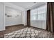 Bright room with hardwood floors, showcasing a decorative rug and natural light at 302 Willow Pointe Cir, Summerville, SC 29486