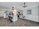 Open concept kitchen with granite island, stainless appliances, and luxury vinyl floors at 302 Willow Pointe Cir, Summerville, SC 29486