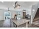 Open kitchen with granite countertops, stainless steel appliances and access to the backyard at 302 Willow Pointe Cir, Summerville, SC 29486