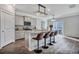 Stylish kitchen featuring an island with barstool seating and modern stainless steel appliances at 302 Willow Pointe Cir, Summerville, SC 29486