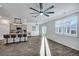 Open concept kitchen with granite island, stainless appliances, and luxury vinyl floors at 302 Willow Pointe Cir, Summerville, SC 29486