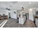 Open-concept kitchen featuring an island with barstool seating and stainless steel appliances at 302 Willow Pointe Cir, Summerville, SC 29486