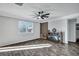 Spacious living room area featuring luxury vinyl floors and a modern ceiling fan at 302 Willow Pointe Cir, Summerville, SC 29486