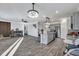 Open concept with luxury vinyl floors, fireplace, and a direct view to the kitchen at 302 Willow Pointe Cir, Summerville, SC 29486