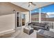Inviting screened porch features comfortable seating and a ceiling fan for enjoying the outdoors at 302 Willow Pointe Cir, Summerville, SC 29486