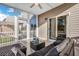 Inviting screened porch features comfortable seating and a ceiling fan for enjoying the outdoors at 302 Willow Pointe Cir, Summerville, SC 29486