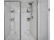 Modern shower with glass doors, a rainfall showerhead, and built-in shelving at 302 Willow Pointe Cir, Summerville, SC 29486