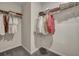 Spacious walk-in closet with ample storage, including rods and shelves for organization at 302 Willow Pointe Cir, Summerville, SC 29486