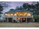 Expansive backyard featuring a spacious deck with a covered porch perfect for outdoor living and entertaining at 3021 Rushland Mews, Johns Island, SC 29455