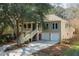 Charming two-story home featuring a welcoming staircase, a two-car garage, and manicured landscaping at 3021 Rushland Mews, Johns Island, SC 29455
