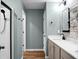 Stylish bathroom showcasing a sleek shower, modern vanity, and elegant fixtures at 305 Lanyard St, Johns Island, SC 29455