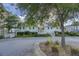 Charming townhome community with well-maintained landscaping and inviting entrance at 305 Lanyard St, Johns Island, SC 29455