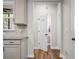 Hallway in kitchen area leads to powder room at 305 Lanyard St, Johns Island, SC 29455