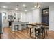Modern kitchen featuring stainless steel appliances, a kitchen island, and bar stool seating at 305 Lanyard St, Johns Island, SC 29455