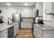 Bright kitchen with stainless steel appliances and countertops at 305 Lanyard St, Johns Island, SC 29455