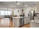 Spacious open-concept kitchen adjacent to living room at 305 Lanyard St, Johns Island, SC 29455