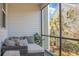 Relaxing screened porch with comfortable seating and a view of the backyard at 305 Lanyard St, Johns Island, SC 29455