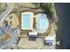 Overhead view of community pool and playground amenities near a tranquil lake at 314 Foxbank Plantation Blvd, Moncks Corner, SC 29461