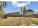 Spacious backyard featuring well-maintained fencing and a comfortable patio set at 314 Foxbank Plantation Blvd, Moncks Corner, SC 29461