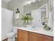 Bathroom featuring a vanity, mirror, white towels, and coastal decor, creating a spa-like retreat at 314 Foxbank Plantation Blvd, Moncks Corner, SC 29461