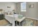 Serene bedroom offers a wrought iron bed, decorative pillows, natural light, and a calming color palette at 314 Foxbank Plantation Blvd, Moncks Corner, SC 29461