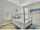 Bright bedroom with a queen size bed and matching nightstands at 314 Foxbank Plantation Blvd, Moncks Corner, SC 29461