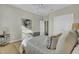 Tranquil bedroom features a comfortable bed, neutral decor, natural light and an artistic accent wall at 314 Foxbank Plantation Blvd, Moncks Corner, SC 29461