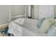 Comfortable bedroom featuring a queen bed, stylish pillows and hardwood flooring at 314 Foxbank Plantation Blvd, Moncks Corner, SC 29461