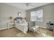 Cozy bedroom featuring a comfortable bed, neutral tones, natural light and stylish decor, creating a peaceful retreat at 314 Foxbank Plantation Blvd, Moncks Corner, SC 29461