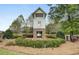 Picturesque community entrance with a pond, gazebo, and manicured landscaping at 314 Foxbank Plantation Blvd, Moncks Corner, SC 29461