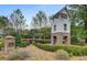 Picturesque community entrance with a pond, gazebo, and manicured landscaping at 314 Foxbank Plantation Blvd, Moncks Corner, SC 29461