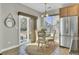 Cozy breakfast nook with a sliding glass door leading to the backyard at 314 Foxbank Plantation Blvd, Moncks Corner, SC 29461