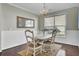 Charming dining area with hardwood floors, natural light, and coastal-inspired decor at 314 Foxbank Plantation Blvd, Moncks Corner, SC 29461